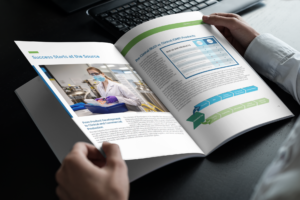 Man reading StemExpress' Clinical Commercial Solutions guide