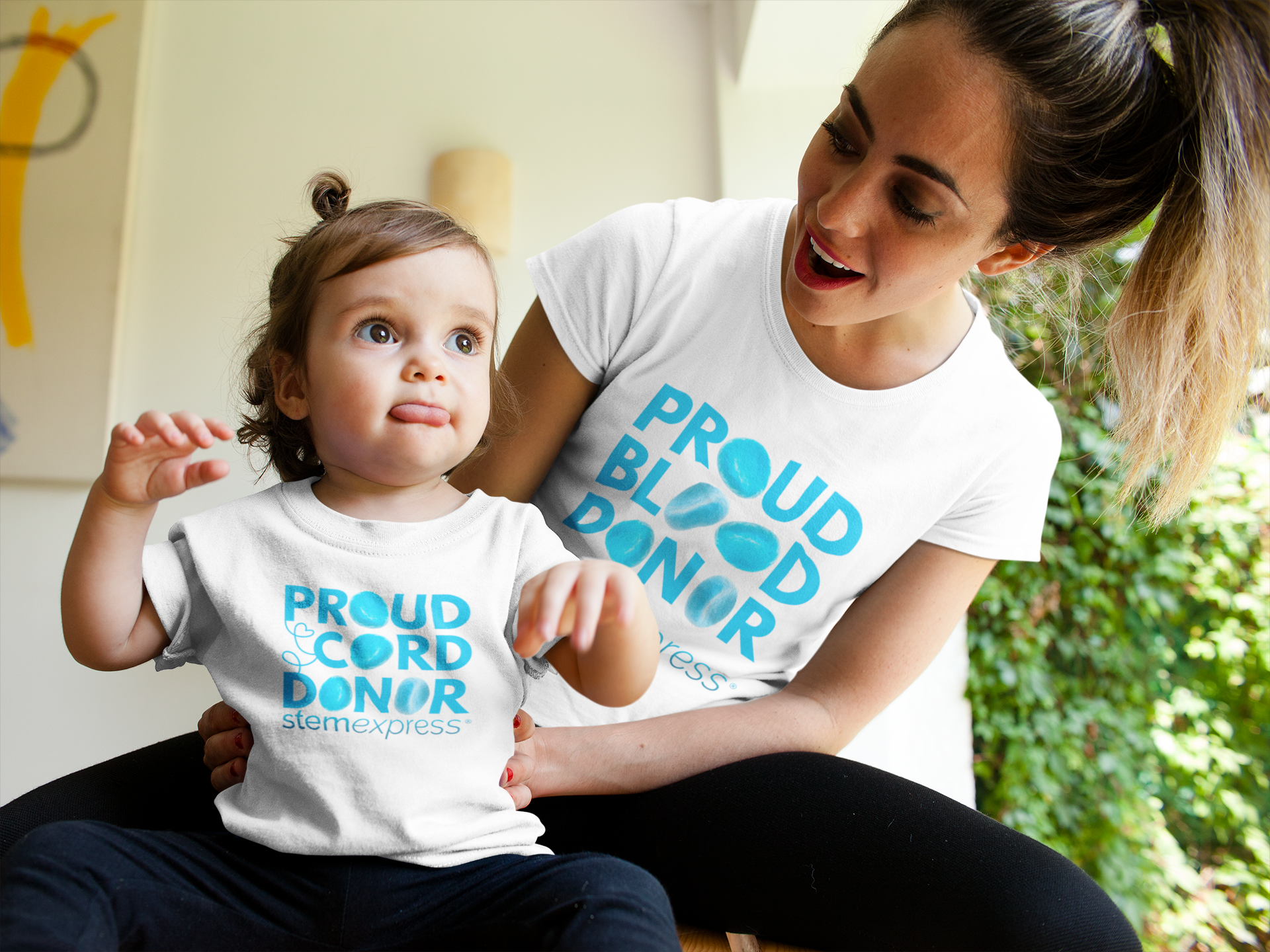 mockup-of-a-mom-and-baby-girl-wearing-different-tshirts-while-talking-a16084